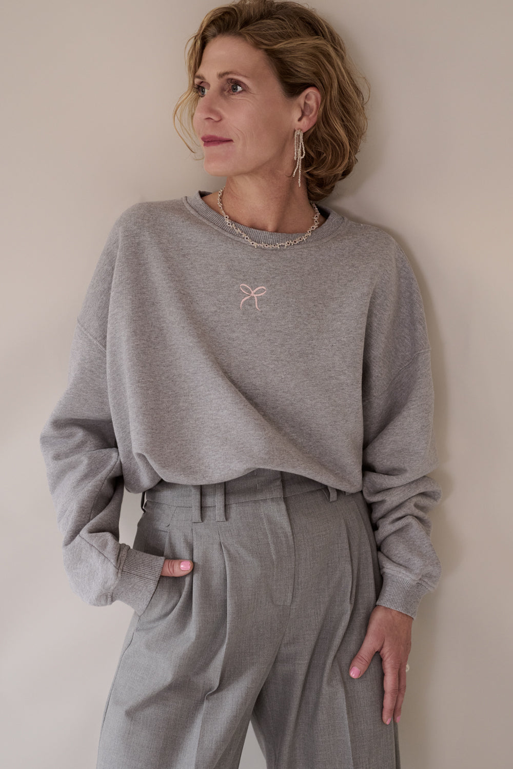 Emma sweater in grey melange with little bow embroidery